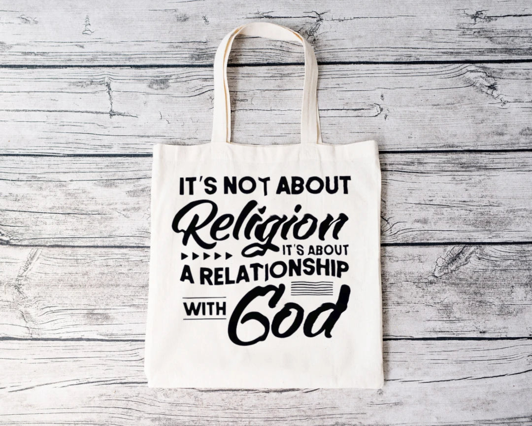 It's Not About Religion Tote (Black Letters)